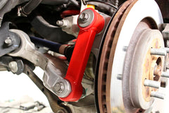 BMR Vertical Links Rear Lower Control Arms Polyurethane Bushings in Red for Ford Mustang 2015-22 | #TCA048 - Available from NEMESISUK.COM